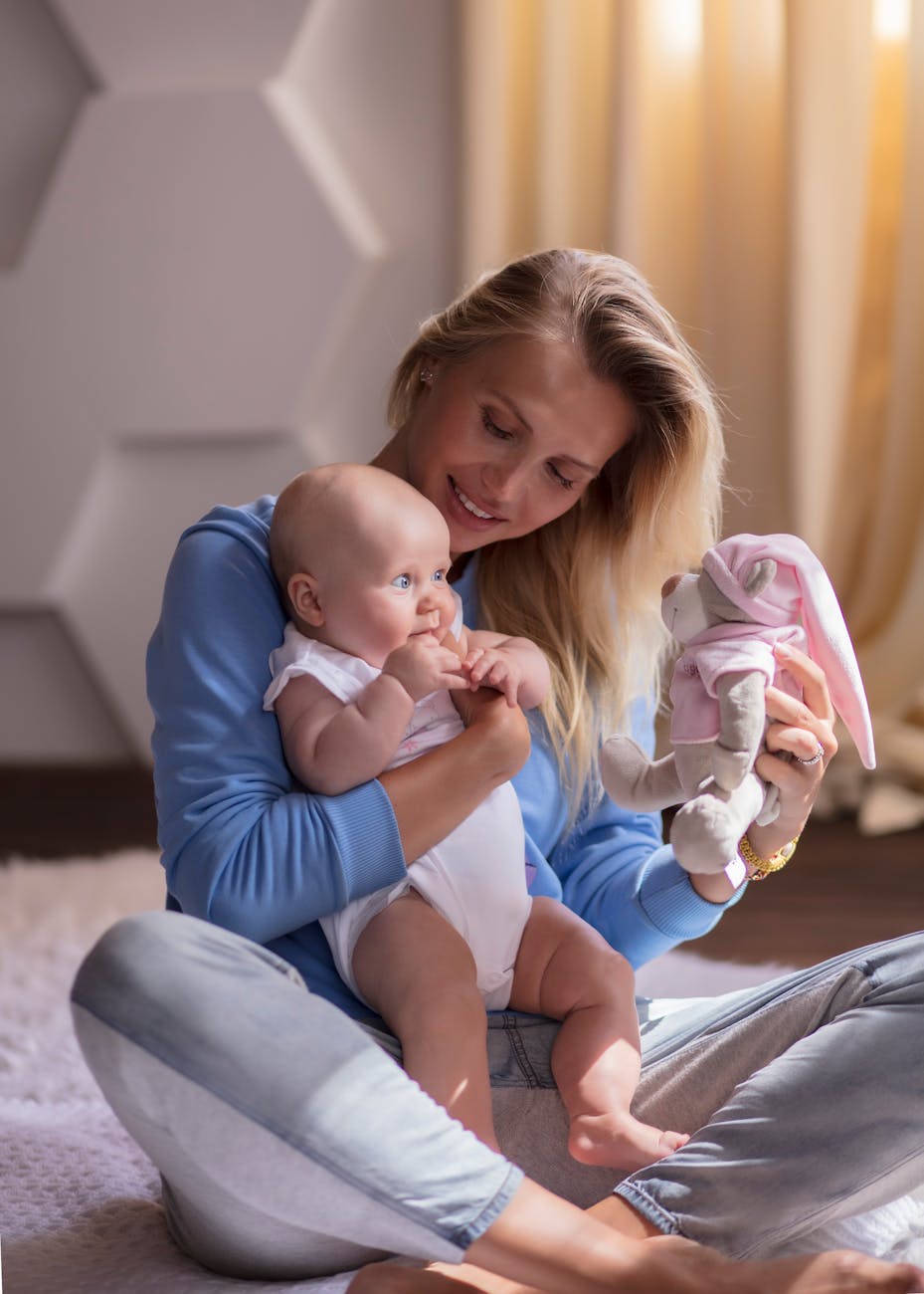 beautiful woman holding a baby