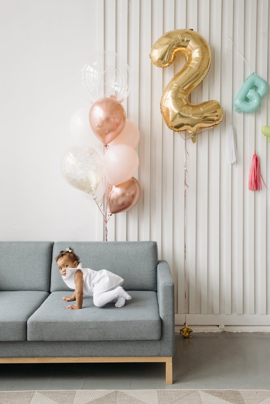 a kid sitting on the couch