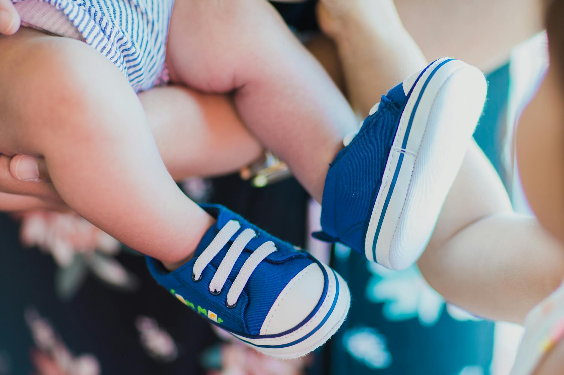 close up photograph of a baby s feet