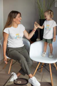 mockup-of-a-mommy-and-her-little-daughter-in-matching-outfits-at-home-26490