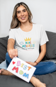 t-shirt-mockup-featuring-a-pregnant-woman-sitting-on-a-couch-32247